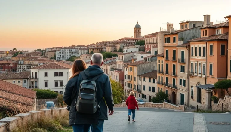 A family walks down a broad paved street overlooking a densely built Mediterranean-style hillside town at warm early morning